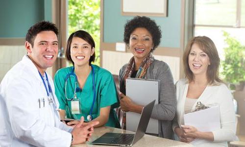 Public Health Nursing Team Smiling in Office